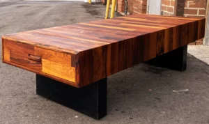 Beat welcomes a well crafted rosewood coffee table to match its existing executive table.